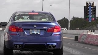 BMW M5 BiTurbo V8 vs Tuned BMW 335 is Turbo  14 mile Drag Race Video  Road Test TV ® [upl. by Obaza979]