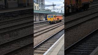 Colas Rail DR73920 Tamper Train Passing Cardiff Central ukrail colasrail rail track freight [upl. by Narrat]