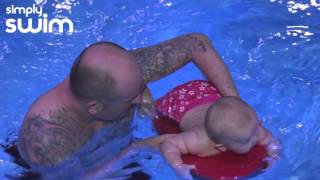 How to Teach your Infant aged 615 months to Swim Using a Float [upl. by Rbma]