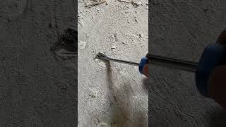 Removing staples from a wooden subfloor using a tack puller and staple remover for narrow staples [upl. by Bowlds]