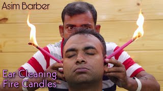 Ear cleaning process with Fire candles  Asim barber Head massage with Neck Cracking  ASMR ear wax [upl. by Genie]