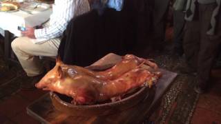 Cochinillo asado cut with a plate in Spain [upl. by Perrins]