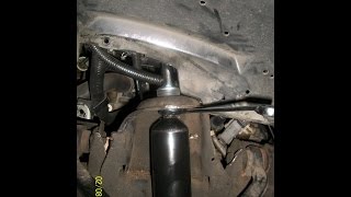 How to replace the front shocks on a 2004 Mazda B3000 [upl. by Ynohtnacram]