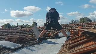 Installing a big middle valley to a tiled roof [upl. by Alexis]