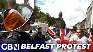 Belfast Antiimmigration protesters fly Tricolour and Union Jack together  Never seen in my life [upl. by Lala]