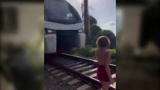 Woman miraculously escapes death after being hit by a highspeed train while posing for a photo [upl. by Nitnelav]