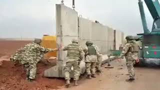 The Turkish occupation army building a concrete wall around the areas it recently occupied in Syria [upl. by Gainor]