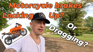 Motorcycle brakes locking up or dragging Solutions [upl. by Lemaj926]