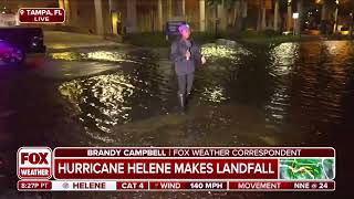 Hurricane Helene kills one from sign falling on top of car [upl. by Alyakim]