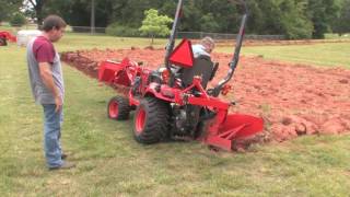 How To Plow With A SubcompactKubota BX Tractor [upl. by Weide492]