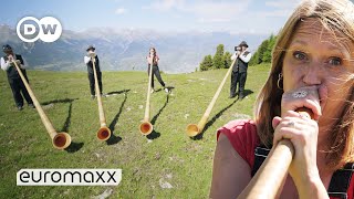 Trying To Play The Traditional Swiss Alphorn  Quirky Customs [upl. by Adnawak]