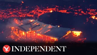 Iceland volcano eruption House burns down as lava river surrounds building [upl. by Ardnoik]