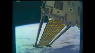 Roll Out Solar Array Experiment ROSA Deploys on ISS Elastic Memory Composites Booms [upl. by Anwahsat]