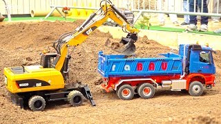 RC CONSTRUCTION MODELS amp RC TRUCKS IN MOTION CAT MOBILE EXCAVATOR [upl. by Euqitsym]