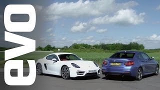 Porsche Cayman vs BMW M235i  evo TRACK BATTLE [upl. by Annay]