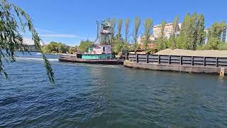 Tugboat and Barge passing under Montlake Bridge [upl. by Rekoob]