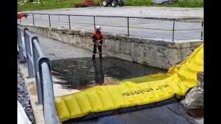 Verunreinigtes Löschwasser auffangen Wassersperre Staustelle [upl. by Jarietta]