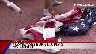 Video Now Protestors burn US Flag in Washington DC [upl. by Andrey]