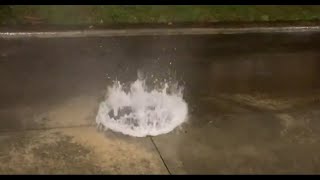 Video shows water overwhelming a manhole cover as Hurricane Beryl moves in [upl. by Ardisi]