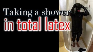 Taking a shower in total latex latexlover latexcatsuit blacklatex latexdoll latexgloves latex [upl. by Peterman]