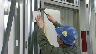 How to Install a Steel Door Frame in Steel Stud Construction  Steel Door Institute [upl. by Christenson80]