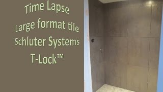 Large format tile shower Shcluter KerdiBoard Glass mosaic and river rock tile TLock™ [upl. by Nide]