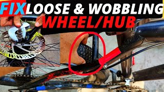 HOW TO FIX WHEEL MOVING LEFT RIGHT  LOOSE AND WOBBLING REAR WHEEL FIX  HOW TO FIX LOOSE HUB MTB [upl. by Ardnauqal]