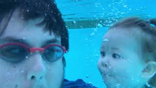 Swimming Baby Holds Her Breath And Smiles at Dad Underwater [upl. by Wardlaw]