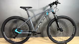 Bicicleta Oggi Big Wheel 70 2024 Shimano Cues GrafiteAzul [upl. by Milburr]