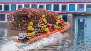 Heroic Rescue of Trapped Dog from Flooded School [upl. by Yona]