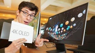 A 4K OLED Monitor Thats NOT a Prototype – Asus PQ22UC  CES [upl. by Nodnart547]