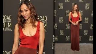 Zoe Saldana goes braless in a plunging red hot dress at 27th SCAD Savannah Film Festival [upl. by Ayita]