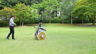 Test driving the two wheeled wheelchair over grass [upl. by Rosenwald]