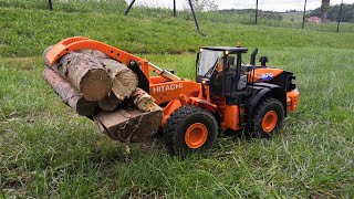 First test of log grapple  Hitachi ZW370 [upl. by Vassili]