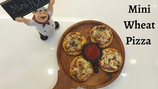 Try this easy recipe of Wheat Mini Pizza on pan  Pizza Base made at home  Milis Kitchen [upl. by Haldes432]