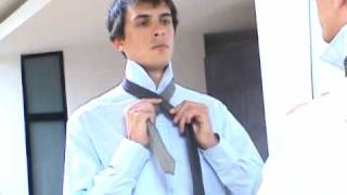 How to tie a tie The Half Windsor [upl. by Kenwrick690]