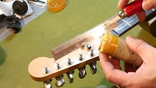 LSR nut installation and fret dressing on a Fender Stratocaster [upl. by Aerbma]