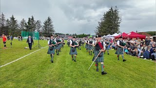 Drum Major leads Ballater Pipe Band playing Cabar Feidh on march during 2024 Dufftown Highland Games [upl. by Nednyl]