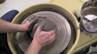 Centering clay on a potters wheel [upl. by Cran546]