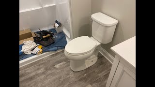 DIY Basement Bathroom  Toilet Installation [upl. by Eleynad786]