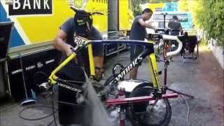 TinkoffSaxo  Mechanics preparing the team bikes [upl. by Oravla893]