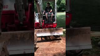 Doing dirt work with a mini excavator [upl. by Zeret847]