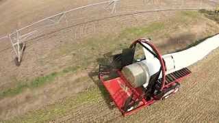 Hauling and Wrapping round bales Stinger style [upl. by Karol]