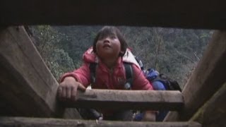 Chinese children climb ladders to get home from school [upl. by Sosanna]