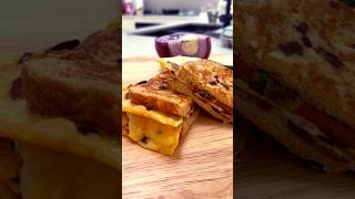 Spicy Cheese Omelette Sandwich with Caramelised Onions amp Sausages in LESS THAN 5 MINUTES shorts [upl. by Neysa179]