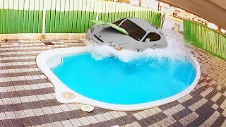 Car Crashes into Pool [upl. by Aillicirp]