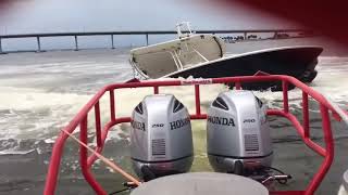 Parbuckling a 27 catamaran by Stuart Florida causeway [upl. by Kcitrap]