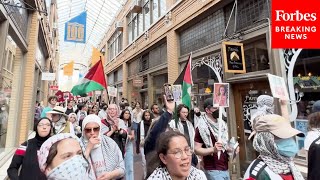 ProPalestinian Protesters March On University Of Michigan Campus In Ann Arbor [upl. by Nylia292]