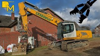 House Demolition with modern hydraulic excavator LIEBHERR 926 tearing down old house 1 [upl. by Darsie]