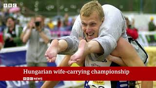 Wifecarrying championship takes place in Hungary [upl. by Alejoa]